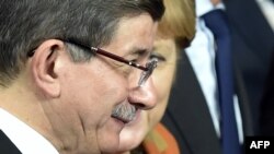 Ахмет Давутоглу и Ангела Меркель