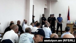 Armenia - Archbishop Bagrat Galstanian and his supporters go on trial in Yerevan, August 19, 2025.