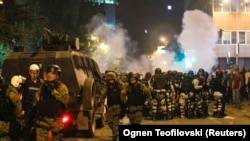 The six lawmakers are among dozens under investigation in connection with an April 27 riot in which protesters stormed into Macedonia's parliament building.