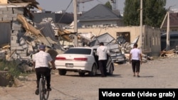 Көк-Жар-2 конушунда бузулган үйлөр.