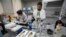 Lab technicians work at Russia's national drug-testing laboratory in Moscow. (file photo)