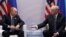 Трамп менен Путиндин алгачкы расмий жолугушуусу. Гамбург, 7-июль, 2017-жыл. 