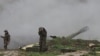 Nagorno-Karabakh - Karabakh Armenian troops fire rounds from a howitzer in the Martakert district, 3Apr2016.