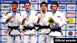 Паҳлавони тоҷик Муҳаммадризо Қувватов дар вазни зери зери 60 кило ҷои савум шуд.