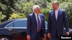 Евробиримдиктин тышкы иштер жана коопсуздук саясаты боюнча өкүлү Жозеп Боррел жана Ирандын тышкы иштер министри Хосейн Амир Абдоллахиян.