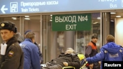 Домодедово аба майданындагы жардыруудан кийин. Москва, 24-январ, 2011-жыл.