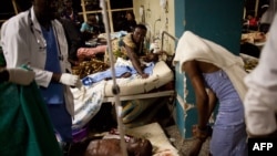 Взрывы в Кампале унесли жизни 64 человек. Десятки оказались ранены.