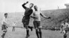 Матч футбольных команд "Динамо" (Москва) - ЦДКА (Москва). В единоборстве армеец Валентин Николаев (слева) и динамовец Леонид Соловьев. 1945. /Фотохроника ТАСС/