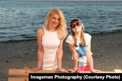 Оксана з донькою Кароліною