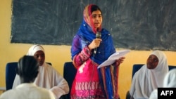 Nobel Prize laureate Malala Yousafzai addresses young refugees in Kenya.