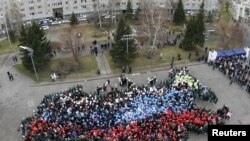 Russia -- Students gather to form the map of Russia as they celebrate the Day of People's Unity in the Siberian city of Krasnoyarsk, 04Nov2010