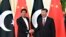 CHINA -- Chinese President Xi Jinping (R) shakes hands with Pakistani Prime Minister Imran Khan before their meeting at the Great Hall of the People in Beijing, April 28, 2019