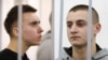 A court in Minsk, Belarus sentenced Ivan Komar (left) and Mikita Yemelyanav to 7 years in prison.