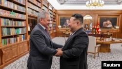 Сергей Шойгу жана Ким Чен Ын.