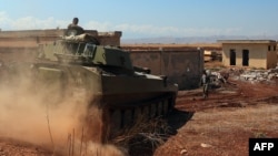 Սիրիա - Կառավարական զորքերի տանկը Խան Շեյխունի մերձակայքում, 18-ը օգոստոսի, 2019թ․