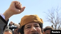 Муамар Каддафи 