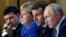 In 2019, Ukraine's Volodymyr Zelensky, Germany's Angela Merkel, and France's Emmanuel Macron meet with Russia's Vladimir Putin. Analyst Olivier Schmitt talked to RFE/RL about how Europe's leaders now face a changing world order.