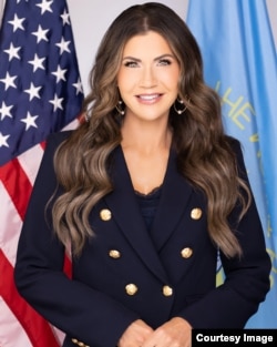 Кристи Ноем.