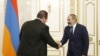 Armenian Prime Minister Nikol Pashinian (right) and Gagik Tsarukian, leader of the Prosperous Armenia Party.