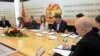 Candidates for mayor of Macedonia's capital, Skopje, sign documents.