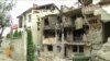 WATCH: Macedonians Survey Gunbattle Damage