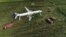 grab Russian Passenger Plane Makes Emergency Landing In Cornfield