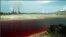 Один из водоёмов города Карабаш окрасился в уникальный рубиновый цвет