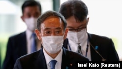 Ёсихидэ Суга. 