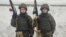 Russian conscripts Konstantin (right) and Dmitry Reshka, 20, were called up in November 2023 for military service, but the twin brothers had no intention of serving for longer than the required year.