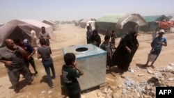 Рамадиден качып чыккан тургундар. 22-май, 2015-жыл