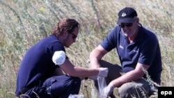 Белгечләр Malaysia Airlines очкычы казасы урынын тикшерә