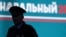 A police officer is silhouetted during an anti-corruption rally in St. Petersburg. The Russian Prosecutor-General's Office reported that the most frequent cases of alleged corruption so far this year had been registered among law enforcement officers. (file photo)