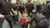 Russia - police beat a protester in St. Petersburg during a protest over pension reform. screen grab protests demonstration