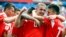 Russia's Yury Gazinsky celebrates with teammates after scoring his side's first goal during the group A match between Russia and Saudi Arabia on June 14 in Moscow. Russia won 5-0.