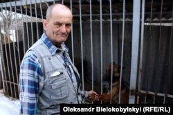 Михайло Сторожок із собакою Юрія