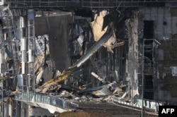 Зруйнований термінал в Донецькому міжнародному аеропорту ім. Сергія Прокоф’єва під час обстрілу, 16 жовтня 2014 року