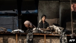 قسمتی از خانه های سوخته مردم در اثر حمله و آتش سوزی در کابل