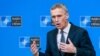 NATO Secretary-General Jens Stoltenberg speaks during a media conference at NATO headquarters in Brussels on December 3.