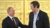 Ресей президенті Владимир Путин (сол жақта) және хокейші Алексадр Овечкин. 2014 жыл. 