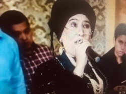 Rustamxo‘ja Usmonov Yulduz Usmonova qiyofasida