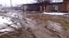 Armenia -- A muddy street in Gyumri.