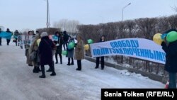Activists protest against human rights abuses in the Kazakh capital, Nur-Sultan, in February 2020.