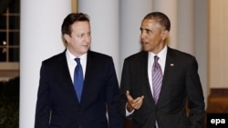 Прем’єр-міністр Великобританії Дейвід Камерон (Л) та президент США Барак Обама