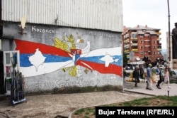 A mural in Mitrovica stating that "Kosovo is Serbia and Crimea is Russia."