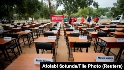 2014-жылы уурдалып каза болгон кыздарды эскерүү акциясы. Нигерия. (Архивдик сүрөт).