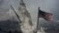 An American flag flies near the base of the destroyed World Trade
Center in New York, one of the targets of the September 11, 2001 terrorist attacks. 