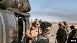 Тела американцев переправлены на базу коалиции и затем будут перевезены в США для окончательного опознания