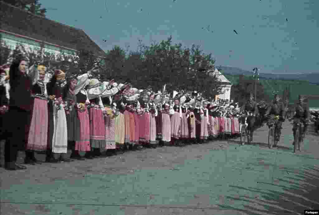 Ethnic Germans in northern Transylvania welcome Hungarian troops with Nazi salutes in 1940. The Romanian region was occupied by Nazi-allied Hungarian forces through most of the war.