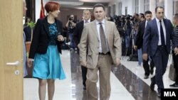 Macedonian Prime Minister Nikola Gruevski (center) arrives for fresh crisis talks among political leaders in Skopje on June 19. 