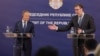 European Council President Donald Tusk (left) and Serbian President Aleksandar Vucic speak to the press in Belgrade on April 25.